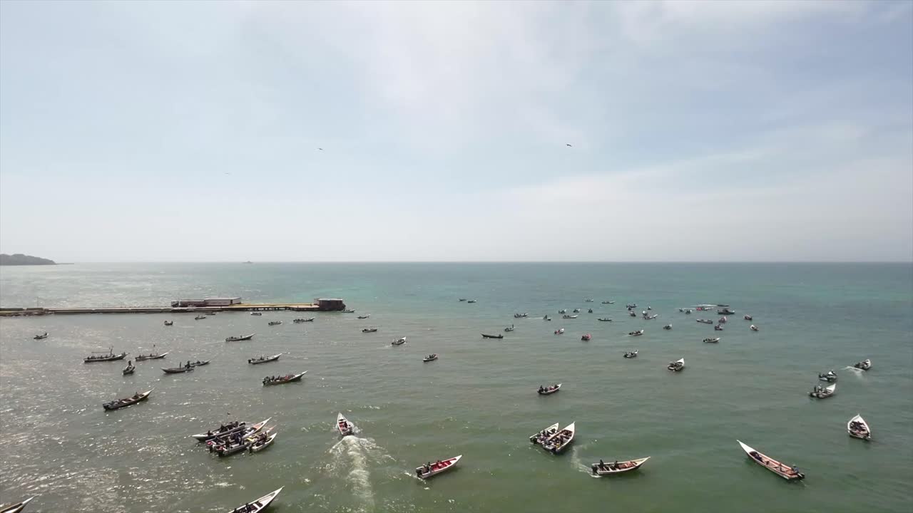 Venezuelan harbour, fishermen community, group gathering, aerial view