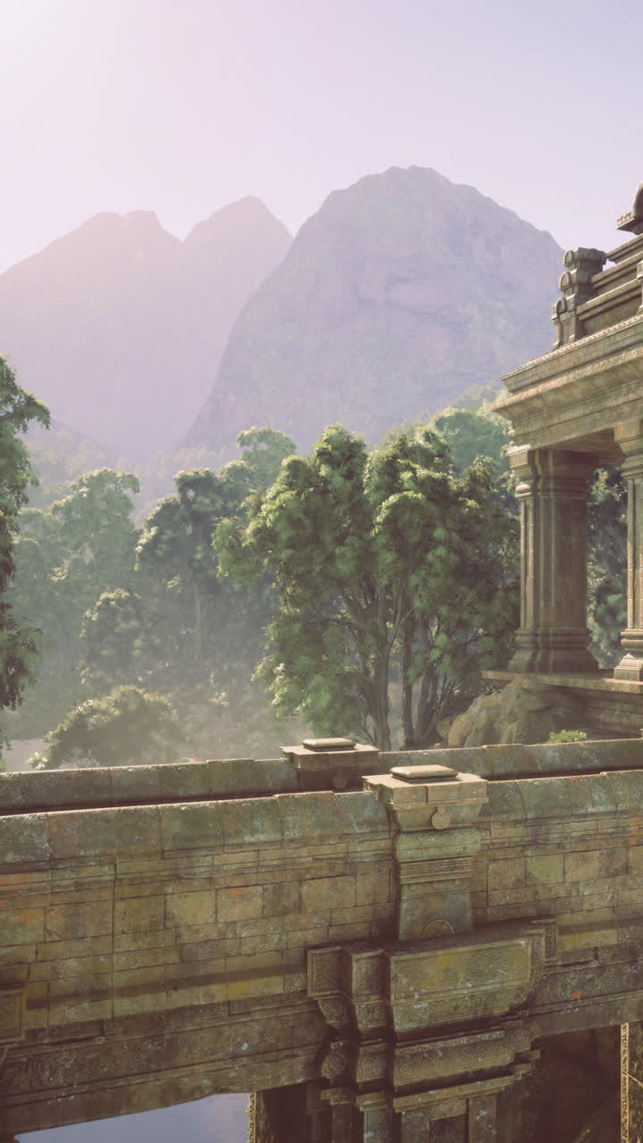 Ancient temple structure among trees on a mountain landscape at sunrise