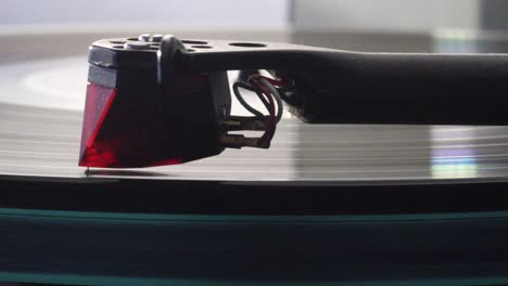 long play vinyl record rotating on a turntable