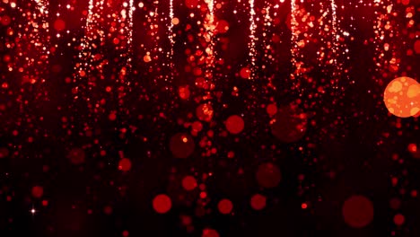 el fondo con partículas de brillo de oro rojo que caen. la lluvia de confeti rojo, la luz mágica, el brillo dorado, el glamour. la hermosa animación de navidad, el fondo del día de san valentín.