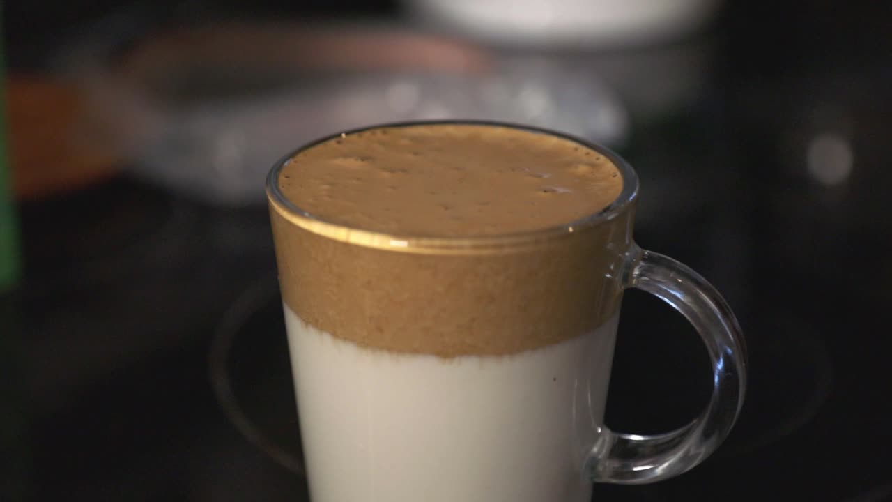 Cup Of A Famous And Delicious Dalgona Coffe On The Table - Close Up Shot