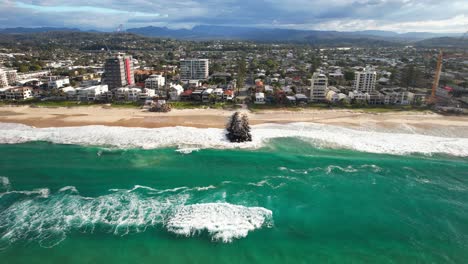 palm beach suburb and ocean coastline in gold coast, queensland, australia - drone shot