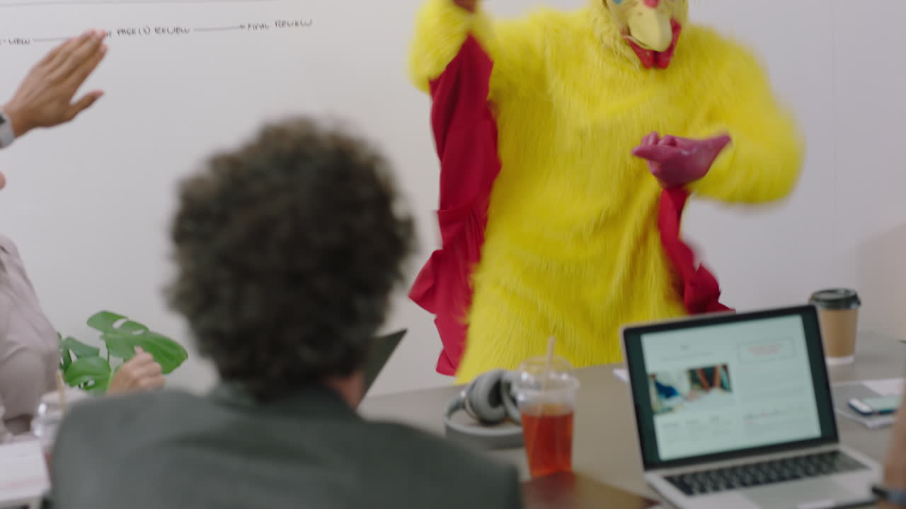 dancing chicken happy business people enjoying funny dance party in boardroom meeting celebrating successful victory crazy rooster high five colleagues excited office presentation