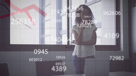 animation of interface showing data and statistics with businesswoman standing in office