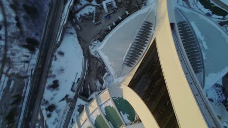 aerial view of montreal olympic stadium in winter