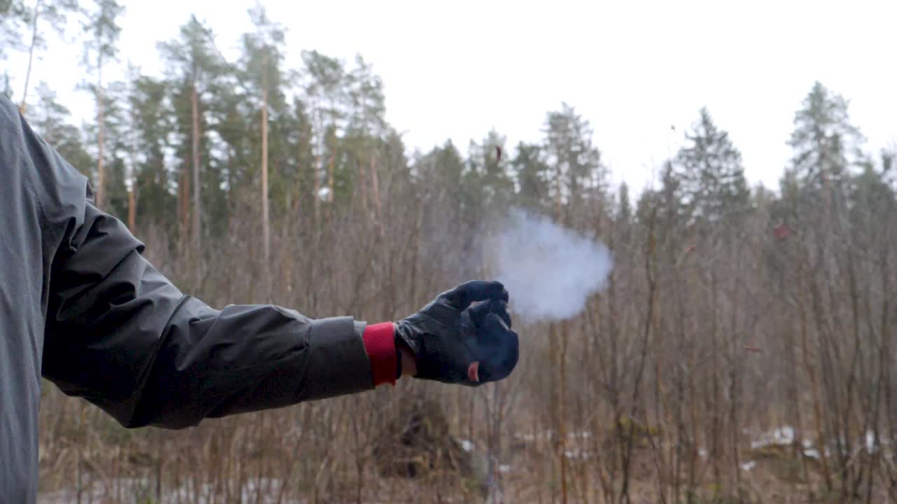 Slowmotion of small firework explosion in hand
