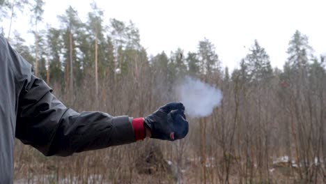 slowmotion of small firework explosion in hand