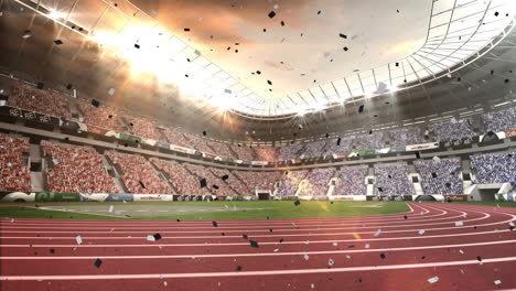 Animation-Von-Schwarz-weißem-Konfetti,-Das-Vor-Der-Kulisse-Eines-Sportstadions-Herabfällt