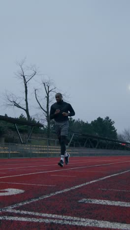 man running on a track