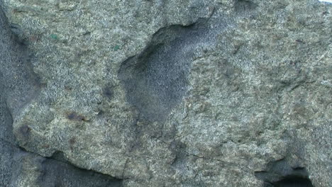 tilt down on the eroded surface of a rock