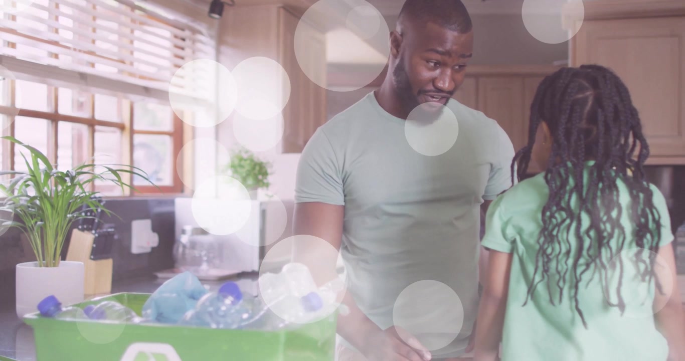 Father placing green bin on counter guiding child sorting bottles for recycling with animated icons