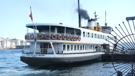 a ferry boat docked at a harbor in istanbul, turkey