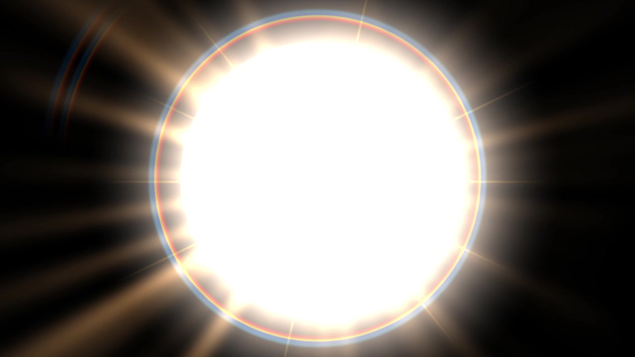 Bright Sun Flare Moving Across Black Background