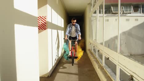 BMX-rider-in-a-corridor-using-smoke-grenades