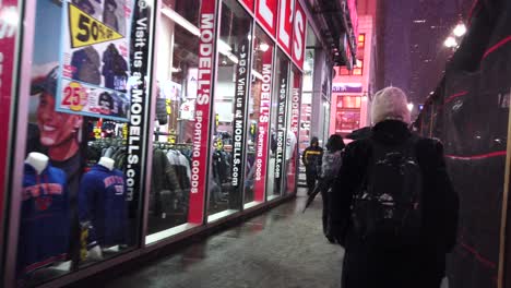 cinematic and slow motion shots filmed in new york city representing everyday lifestyle with a personal feel-first person in 4k. these were shot around the city during a snowstorm at night.