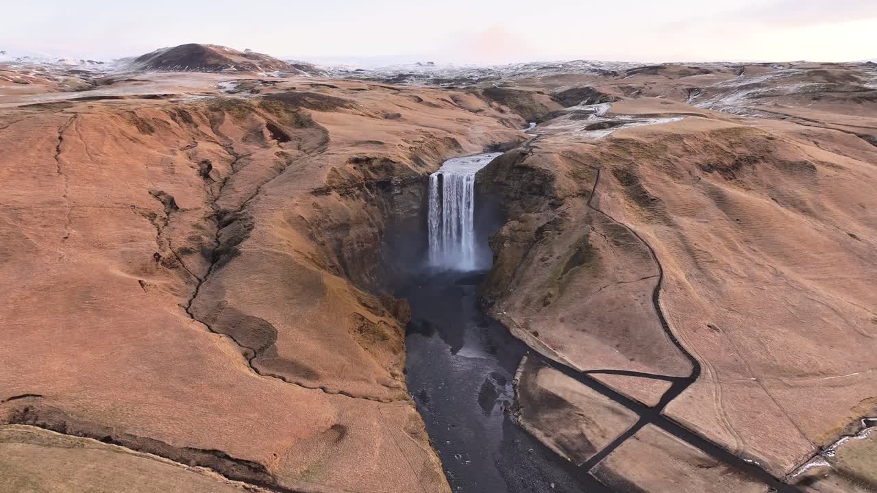 Aerial of Skógafoss waterfall and canyon near Eyjafjallajökull Iceland
