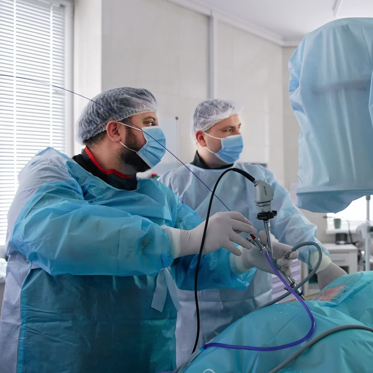 Hospital modern surgical healthcare. Professional group of surgeons working in emergency room