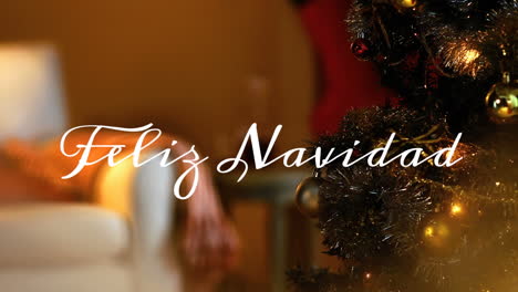 feliz navidad written over christmas tree