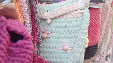 handmade knitted bags on display
