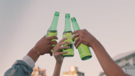 group of women friends celebrating rooftop party making toast drinking alcohol enjoying celebration on weekend social gathering at sunset