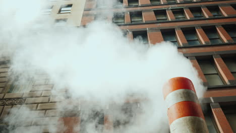 striped pipe from which the steam goes - one of the symbols of new york 4k video