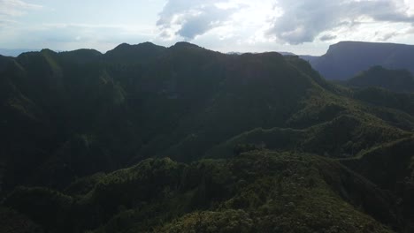 A-panoramic-view-of-a-mountain-range-that-blocks-out-the-sun