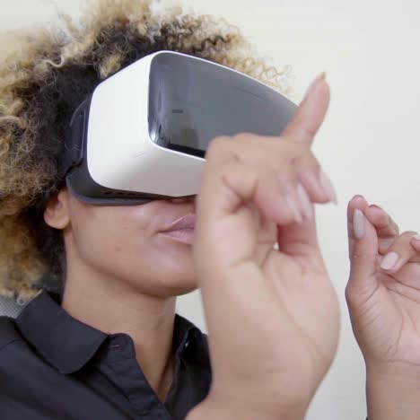 Young-woman-wearing-virtual-reality-glasses