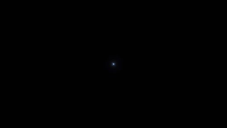 el destello realista de la lente de luz sobre un fondo negro.
