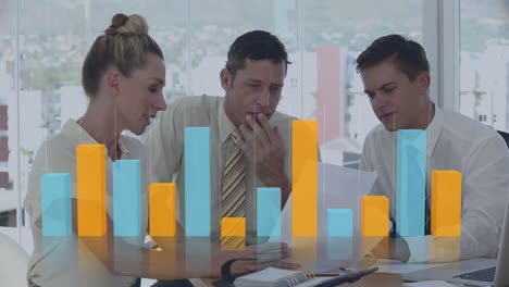 animation of bar graph over caucasian coworkers discussing on desk in office