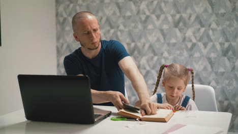 daddy sitting at computer in room