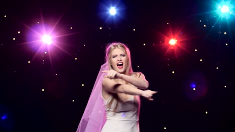 bride dancing at a party