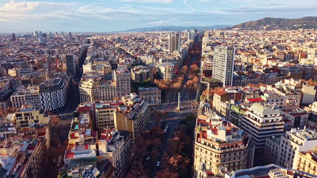 Panoramic drone fly over the famous Avenida Diagonal as Barcelona's broadest avenue in winter, Barcelona, Spain