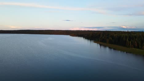 Stunning-Cobb-Lake-surrounded-by-a-vast,-dense-forest-in-the-countryside-of-British-Columbia,-Canada