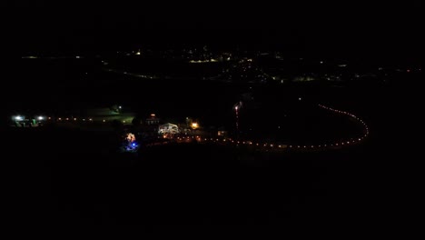 Impressive-fireworks-display-on-São-Miguel-island,-night-aerial-view