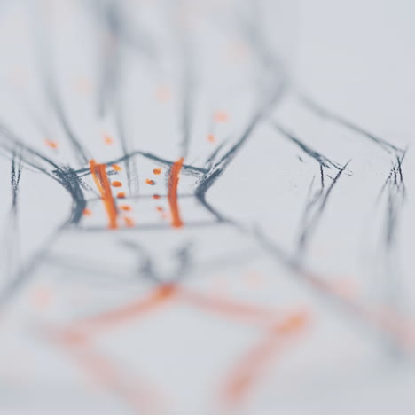 sketch of woman's clothes written by pencils on paper. orange and gray illustration of fashionable design of a dress. designer's outline for sewing clothes. close-up