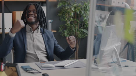 happy businessman in office