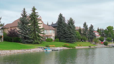 lakeside home in community during an overcast day