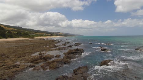 4K-Aerial-rocky-beach-of-south-Australia---Drone-low-altitude-dolly-in-shot-1