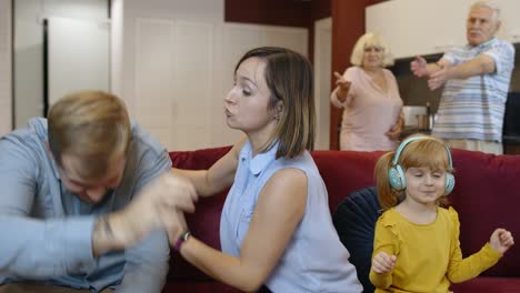 happy family dancing in the living room