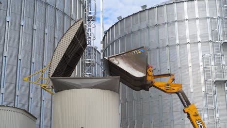 steel silos for storing grain. grain elevator at modern agro processing factory