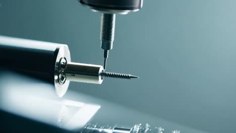 close-up of a screw being machined on a cnc machine