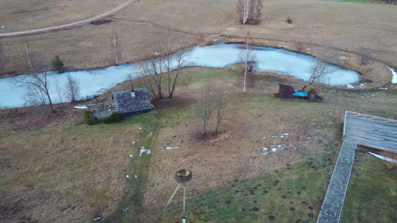 Old Araisi Windmill in Latvia Aerial Shot From Above. Winter Day at Sunrise. This Is the Only Windmill in Latvia at Working Order Built in 1852. 4K Shot