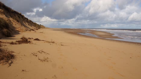 Hemsby-Beach-and-Sandunes,-with-sea-on-top-third