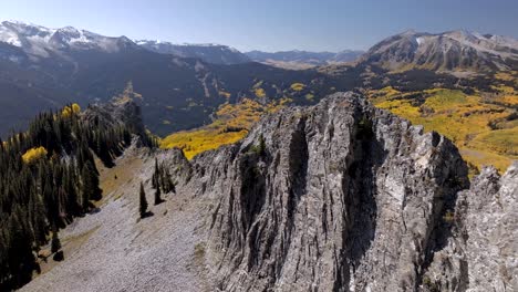 drone flys around rocky spine on ruby peak looking at marcellina mountain and anthracite range colorado