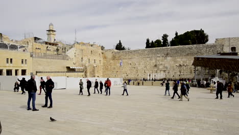 people gather at the historic western wall in jerusalem