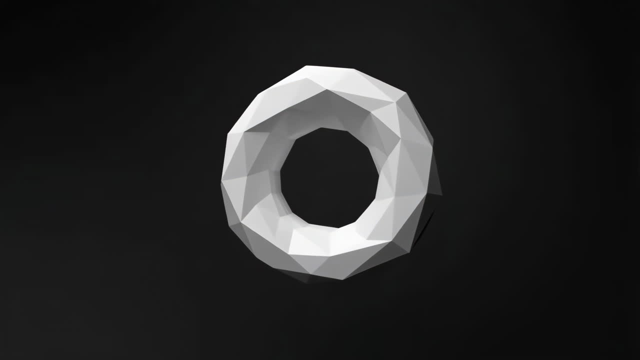 Low-poly white torus on a dark background