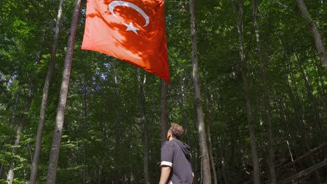 civilian teenager greeting the turkish flag.
