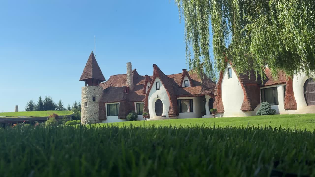 Hobbit style fairytale castle of Lut in Transylvania. Panning view