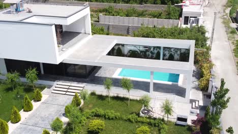 minimal architecture design modern house luxury villa in countryside in tropical forest climate in saudi arabia culture modern city swimming pool vegetation barbecue party family gathering friends