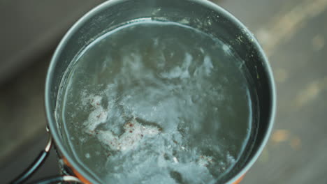 closeup view 4k stock video footage of mug full of boiling water